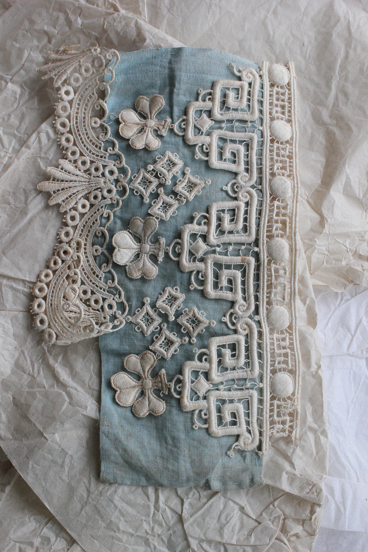 Beautiful Reclaimed Broderie Lace Sample on Blue Fine Linen