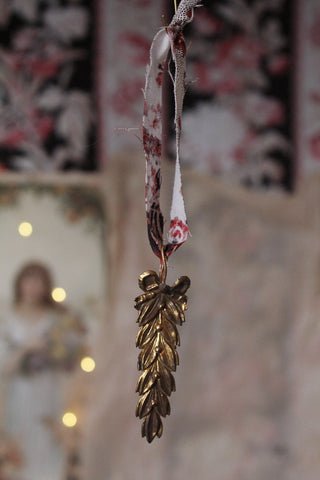 Old French Pressed Brass Leaf Decoration With Printed Cotton Hanger