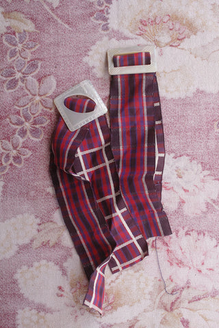 A Pair of Carved Mother of Pearl Buckles on Ribbon Lengths