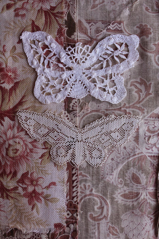 Two lovely lace butterflies.