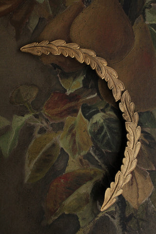 Old Military brass gold leaf cap badge