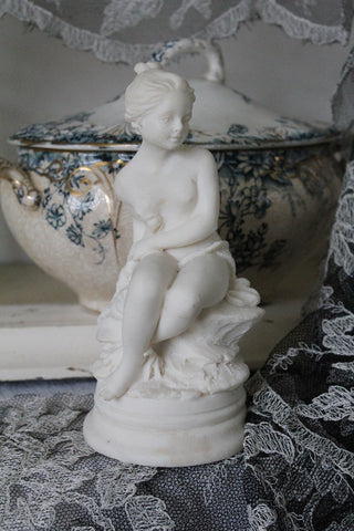 Old Ornament - Seated Girl
