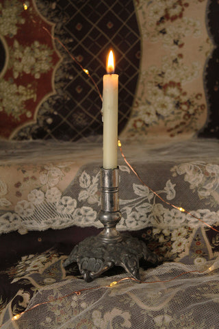 A Very Old Decorative Pewter Candlestick